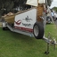 Whaleboat mounted on a trailer, with sail in place