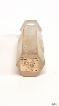 Glass has imperfections!, handwritten label attached