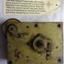 Brass mechanism with working parts, information above it