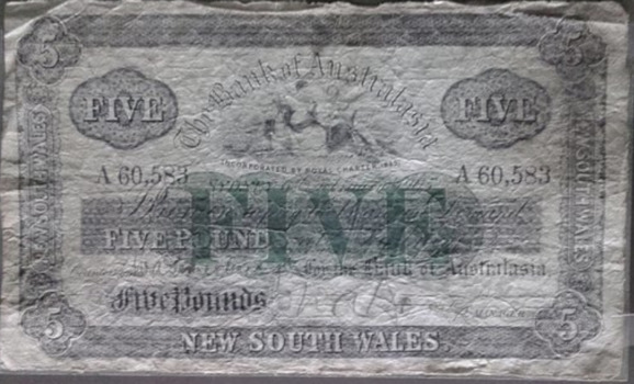 Banknote is overprinted with the serial number and denomination