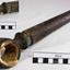 Metal pipe has an open circular fitting attached