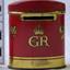 Tin cylinder with domed lid, Red with gold inscriptions and decoration. Top edge of base has a slit.