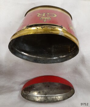 Oval base and domed oval lid, both showing signs of wear