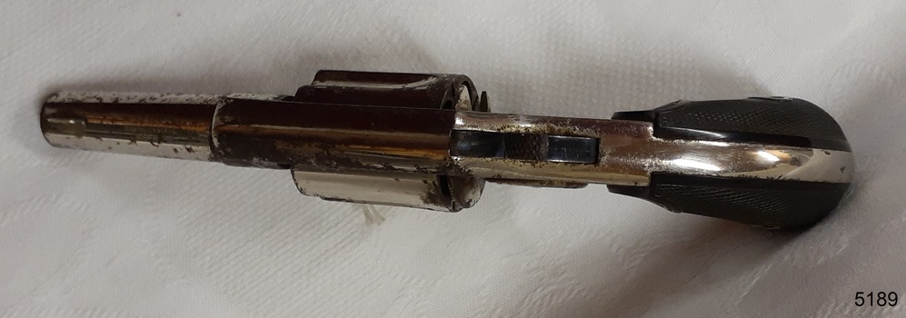 Barrel chamber and bullet lever are visible at this angle