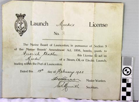 Printed page with handwritten details and printed logo