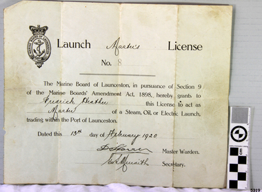 Printed page with handwritten details and printed logo