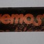 Glass container or vial with contents and cork, and label named Haemostop.