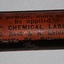 Glass container or vial with contents and cork, and label named Haemostop.