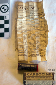 Container or vial that once contained  pills, and a label named Carbocine. Also an instuction leaflet.
