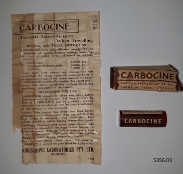 Container or vial that once contained  pills, and a label named Carbocine. Also an instuction leaflet.