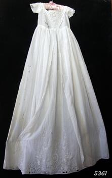 Child's long white christening gown with short sleeves