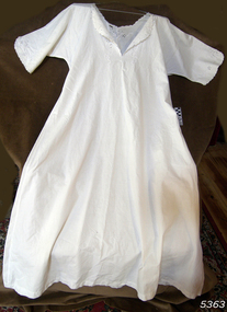 Simple long nightgown with long sleeves and embroidered decoration