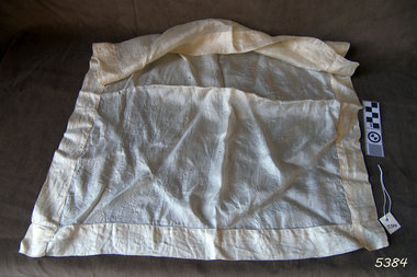 Cream silk handkerchief with wide hem around the edges