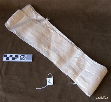 White long narrow silk fabric, folded several times