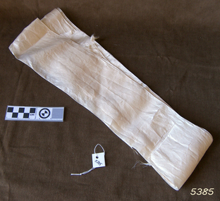 White long narrow silk fabric, folded several times