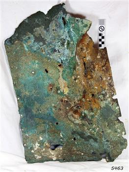 Munts sheathing with holes along the edge where it was once attached to a ship