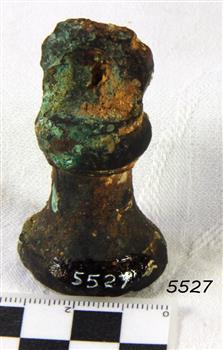Weight is metal and shaped like a domed bell
