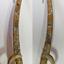 Wooden sword is carved and decorative