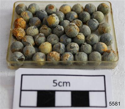 Lead shot balls with mould mark and corrosion