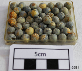 Lead shot balls with mould mark and corrosion