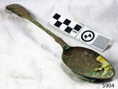 Spoon has encrustations from its time at sea