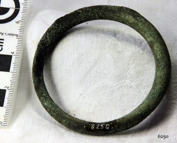 Harness ring has verdigris and is distorted