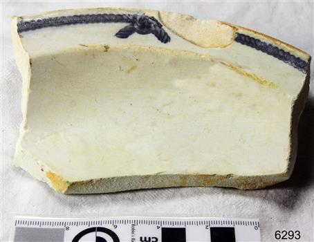 White china section with a blue 'rope' motif with a knot border on the edge
