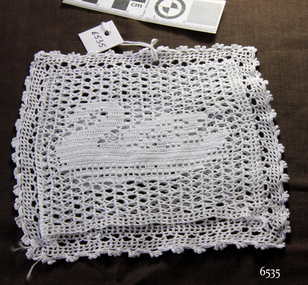 White crocheted lavender bag with double layer centre and answan incorporated into the design