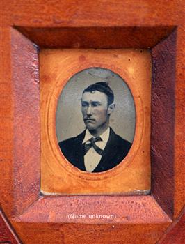 Portrait of male wearing jacket, shirt and tie. 