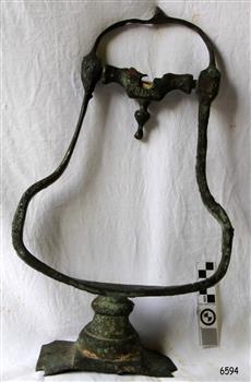 Metal bell-shaped frame with fittings for attaching it to other objects
