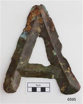 Brass letter "A" with a devilled shape that peaks in the centre