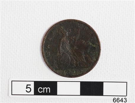 Coin has image of a seated female with a trident in her hand