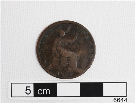 Coin shows seated woman holding a trident