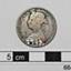 Coin shows side profile of a young female