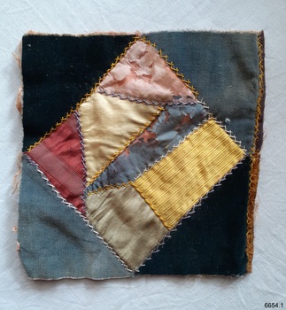 Patchwork square with lining, prepared for adding to patchwork piece of work