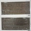 A pair of matching nameplates