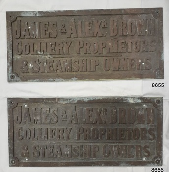 A pair of matching nameplates