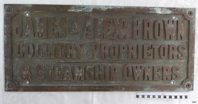 Brass cast nameplate with border and three rowsof test