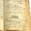 Handwritten notes are added to the printed page