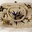 Purse has beaded floral design with round beaded handles and metal clasp