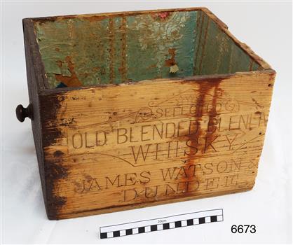 Inscription on the side has text relating to whiskey