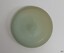 Cap liner glass has imperfections. There is a grp in the centre 