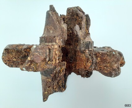 There is a groove visible where there was once a plug, mail or screw fitted to hold the spoke on.