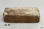 Rectangular house brick has some concretion