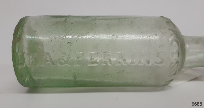 Raised inscriptions on body. Bubbles and impurities in glass