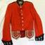 Red jacket has gold buttons, black collar, epaulettes and cuffs