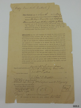 Yellow-brown paper with printed and handwritten text
