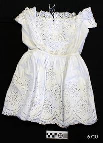 White dress with short sleeves and broderie anglaise inserts