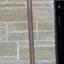 Timber oar with blade painted brown and white