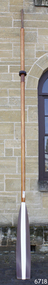 wooden oar with painted blade, brown and white